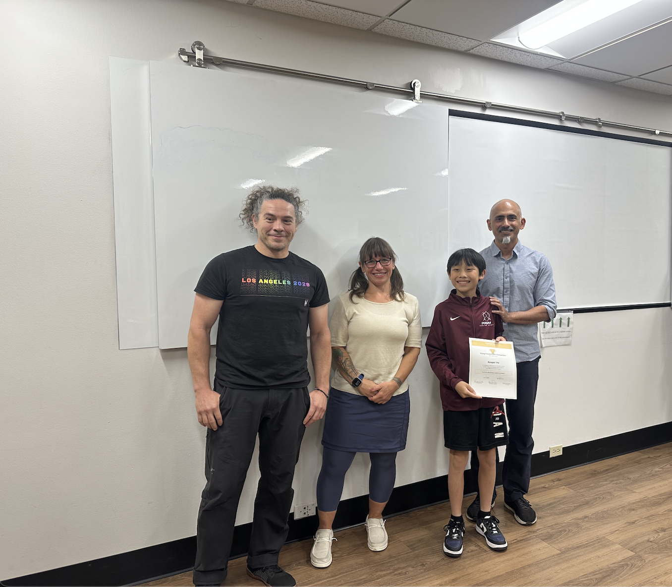 Fencer receiving certificate